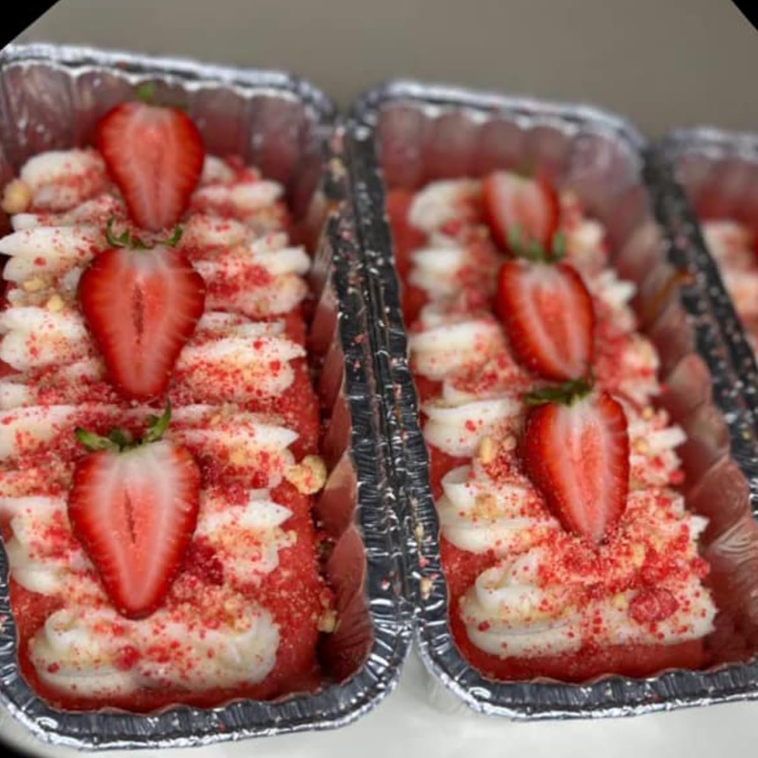 Wholesale 100 Pack 7.8 x 4.53 x 2.17 Inch Disposable Aluminum Loaf Pans with Clear Lids and Strong Seals for Freshness Spill Resistance Manufacturer